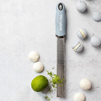 Microplane Zester Grater in Sky Blue for Citrus Fruits, Hard Cheese, Ginger, Chocolate and Nutmeg with Fine Stainless Steel Blade - Made in USA